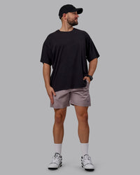 Man wearing Unisex Washed Pressure Heavyweight Tee Oversize - Black-White
