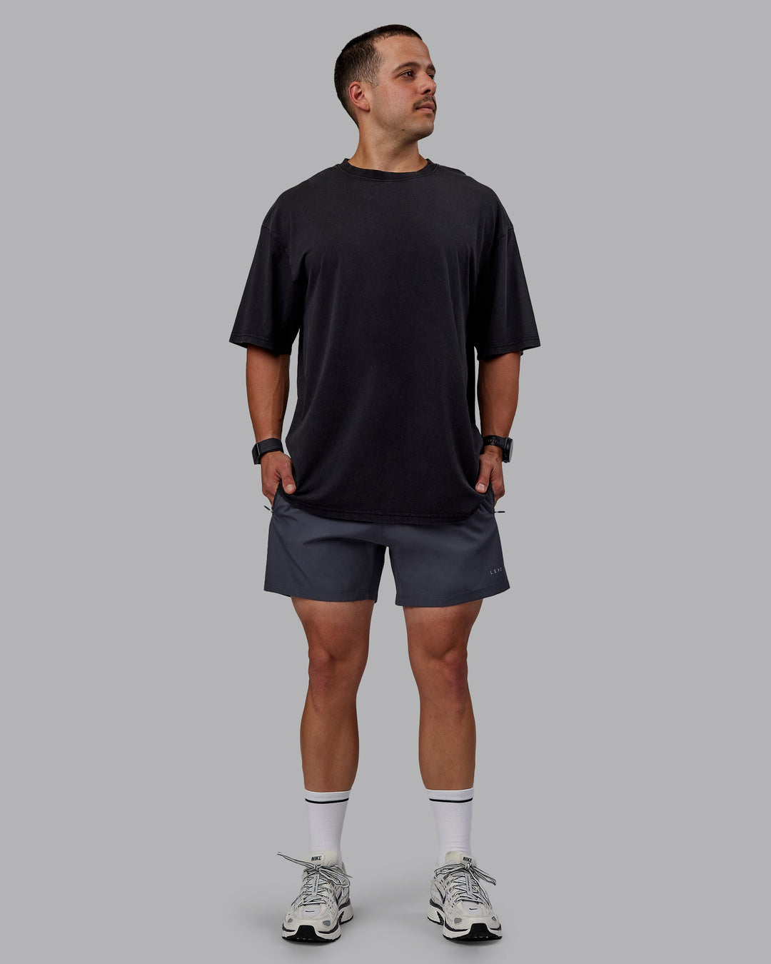 Man wearing Set The Standard Washed FLXCotton Oversized Tee in Black-Black | Size:L