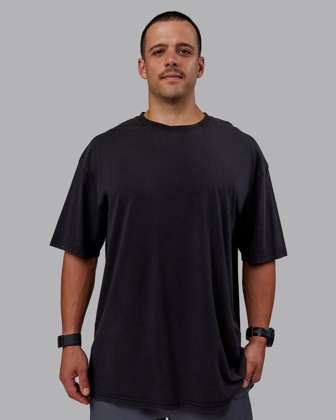 Man wearing Set The Standard Washed FLXCotton Oversized Tee in Black-Black | Size:L