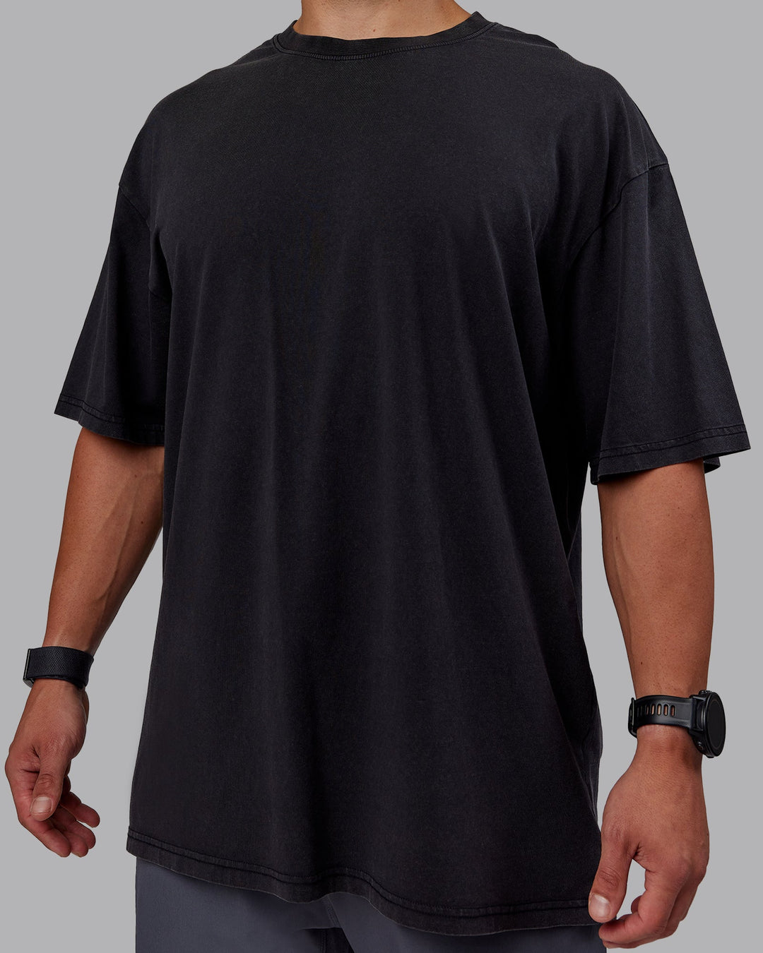 Man wearing Set The Standard Washed FLXCotton Oversized Tee in Black-Black | Size:L