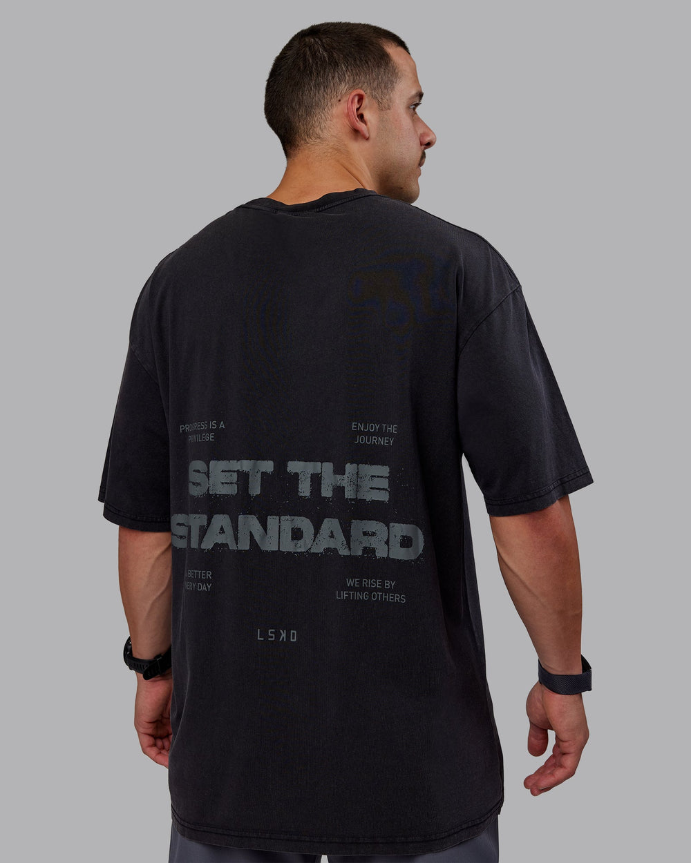 Man wearing Set The Standard Washed FLXCotton Oversized Tee in Black-Black | Size:L