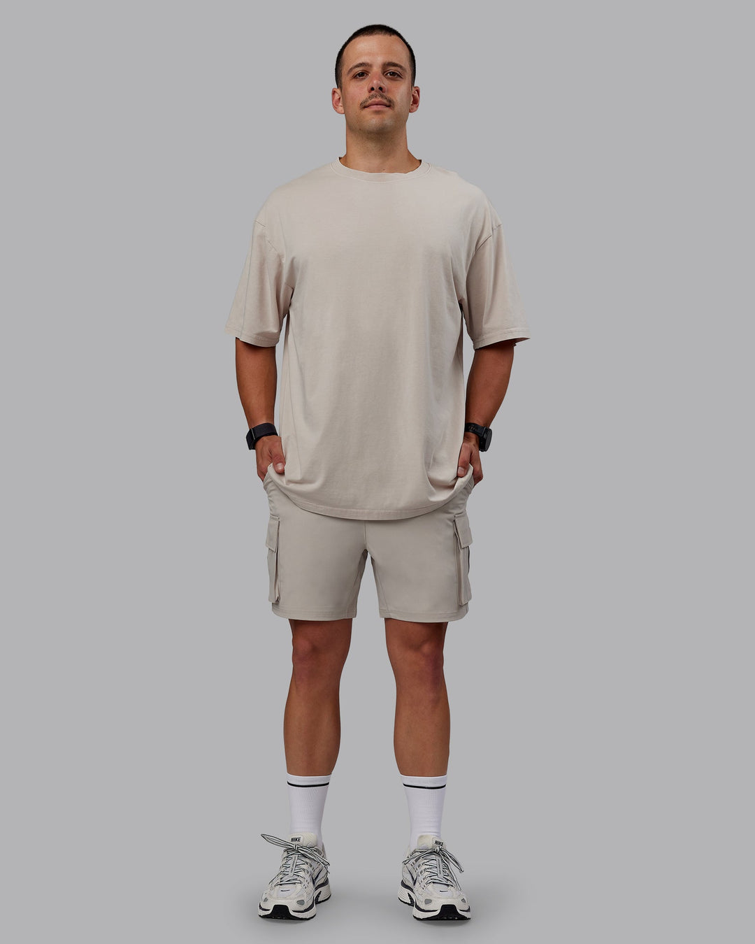 Man wearing Set The Standard Washed FLXCotton Oversized Tee - Shale Beige | Size:L