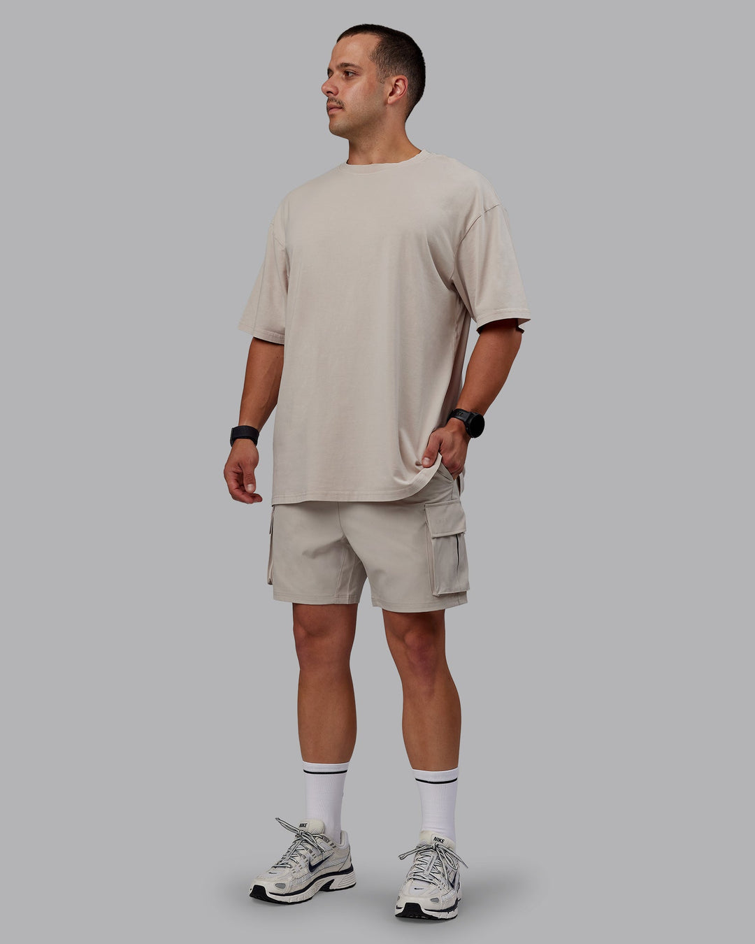 Man wearing Set The Standard Washed FLXCotton Oversized Tee - Shale Beige | Size:L