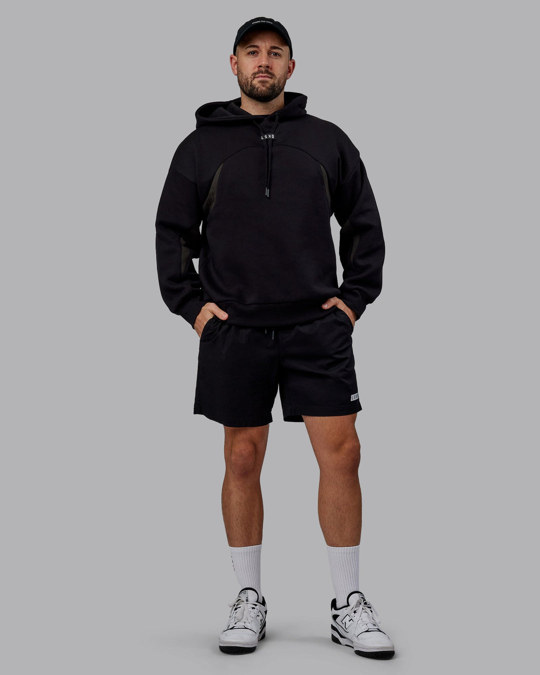 Man wearing Unisex Y2K Concept Panel Hoodie - Black-Black-Pirate Black