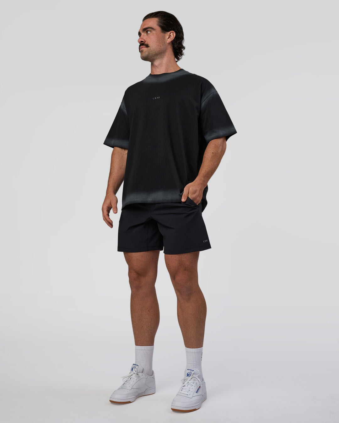 Man wearing Urban Blur Heavyweight Unisex Oversized Tee - Black-Dark Storm | Model:Adam | Size:L