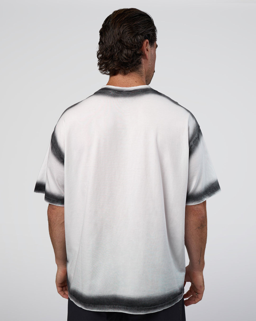 Man wearing Urban Blur Heavyweight Unisex Oversized Tee - White-Black | Model:Adam | Size:L