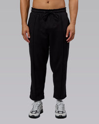 Man wearing Urban Cropped Track Pant - Black| Model:Kaelyb | Size:L