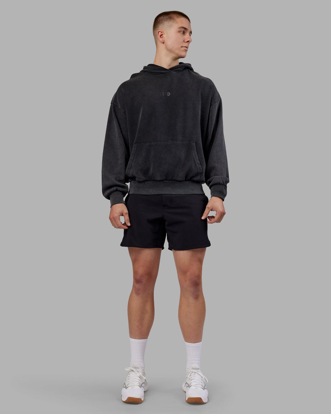 Man wearing Variation Washed Oversized Hoodie - Black-Black | Model:Tom | Size:L