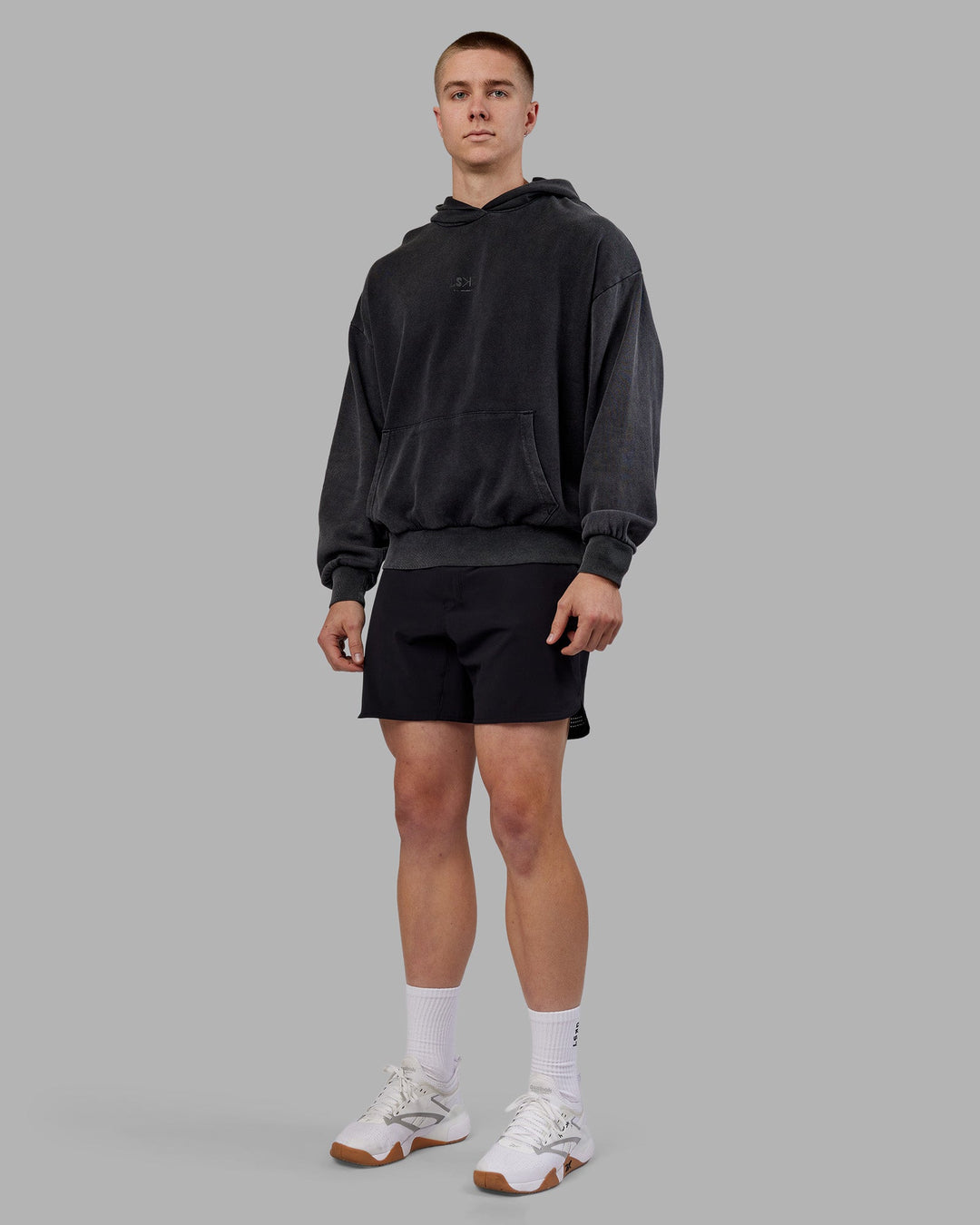 Man wearing Variation Washed Oversized Hoodie - Black-Black | Model:Tom | Size:L