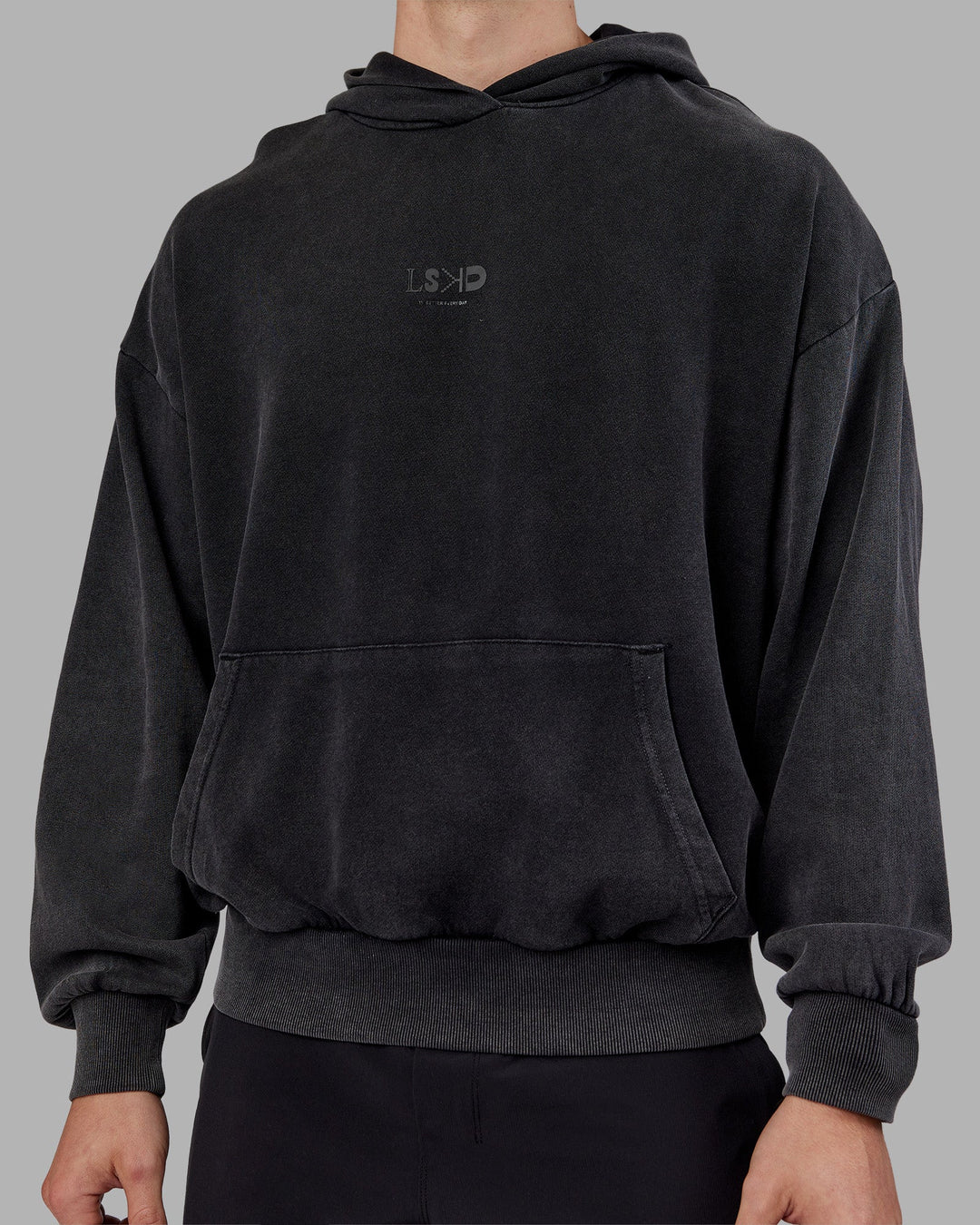 Man wearing Variation Washed Oversized Hoodie - Black-Black | Model:Tom | Size:L