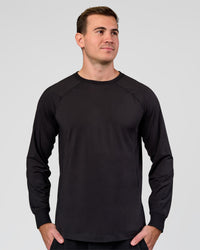 Man wearing Restore CloudFLX Sweater Black | Model:Alex | Size:M