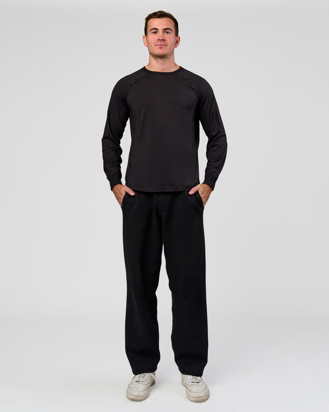 Man wearing Restore CloudFLX Sweater Black | Model:Alex | Size:M