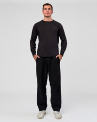 Man wearing Restore CloudFLX Sweater Black | Model:Alex | Size:M