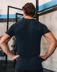 Man wearing AeroFLX+ Seamless Tee - Navy/Navy | Model: | Size:M