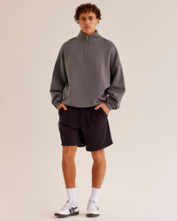 Man wearing AfterDark ZeroCrease Quarter Zip - Duskstone | Model:Leandro | Size:M