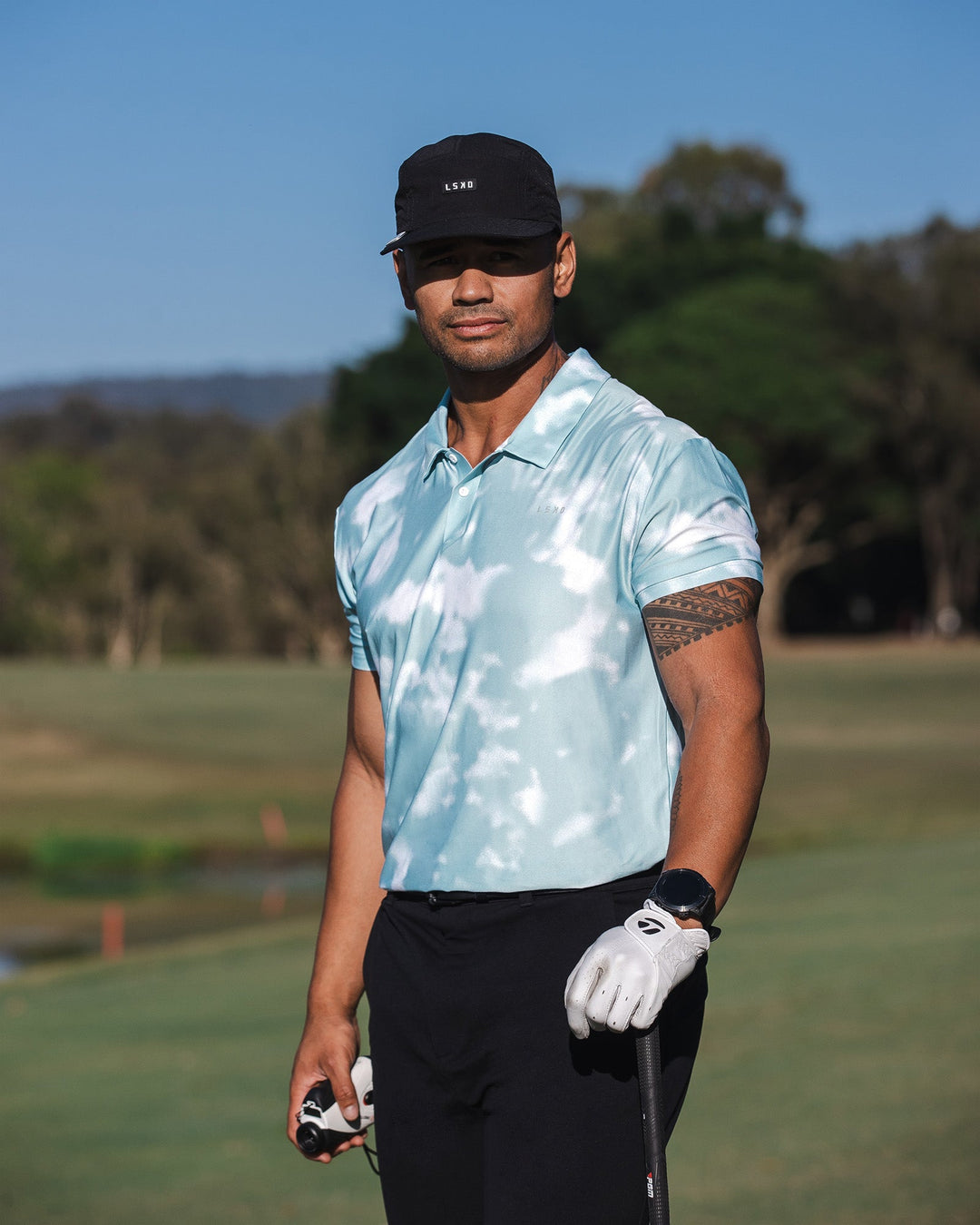 Man wearing Drive Polo - Sky Washed Camo | Model:Moses | Size:L