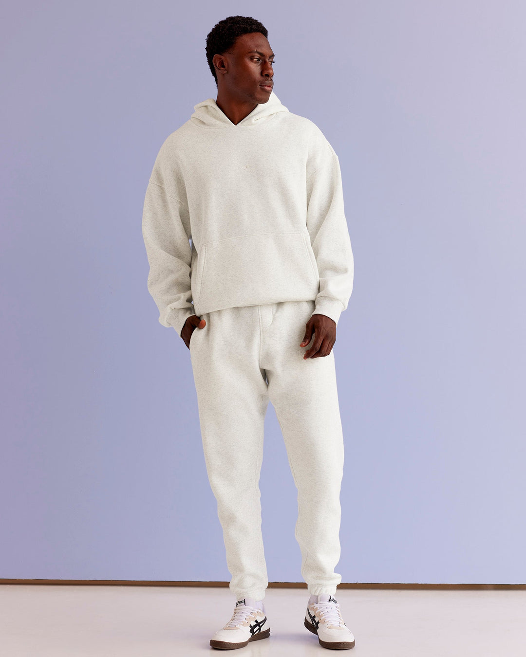 Man wearing MVP Cuffed Track Pant - Silver Marl | Model:Paabio | Size:L