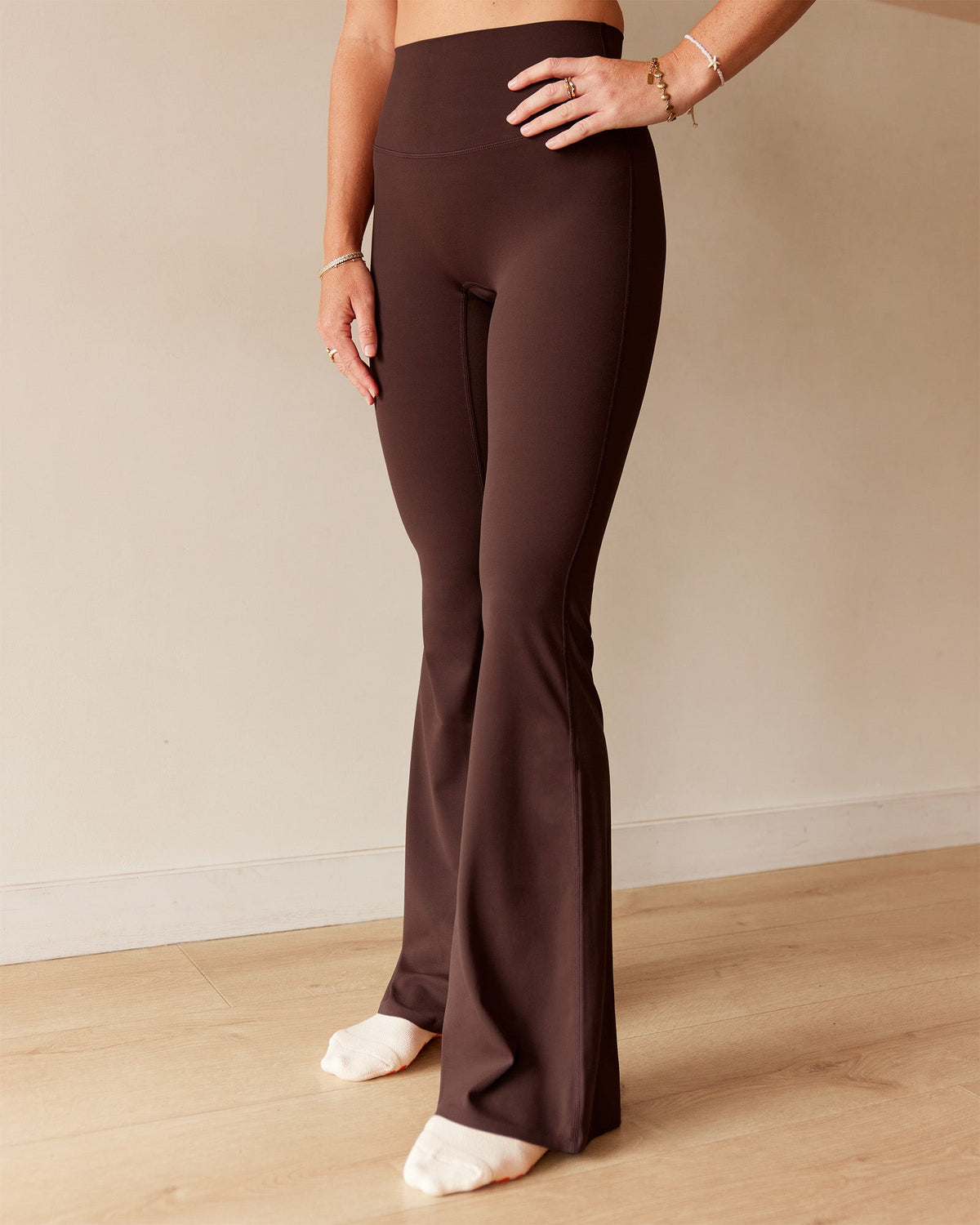 Woman wearing Peaches Elixir High-Rise Flared Pant - Hot Chocolate | Model:Dani | Size:M - view 1