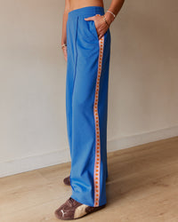 Woman wearing Peaches Track Pant - Palace Blue | Model:Dani | Size:M | Thumbnail Index: 1