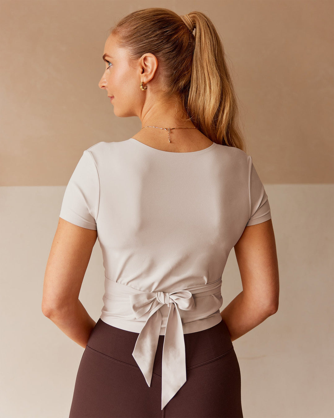 Woman wearing Peaches Wrap Cinch Top - Shale Beige | Model:Tori | Size:M - view 4