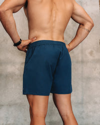 Man wearing Rep 5'' Performance Short - Night Sea | Model: | Size:M