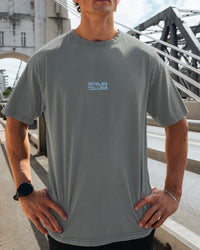 Man wearing Runner's FLXCotton Oversized Tee - Dark Storm Washed-Open Air | Model:Julz | Size:M