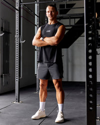 Man wearing Static Grit Lift 6" Short - Black-Alloy | Model:Jaiden | Size:M