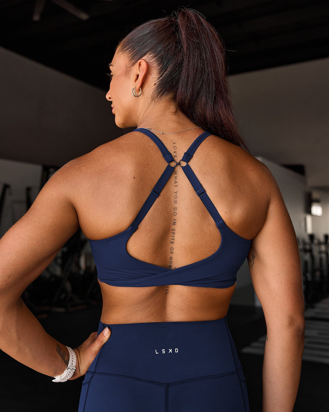 Woman wearing Twist Sports Bra D/DD/E - Future Navy | Model:Chyna | Size:M