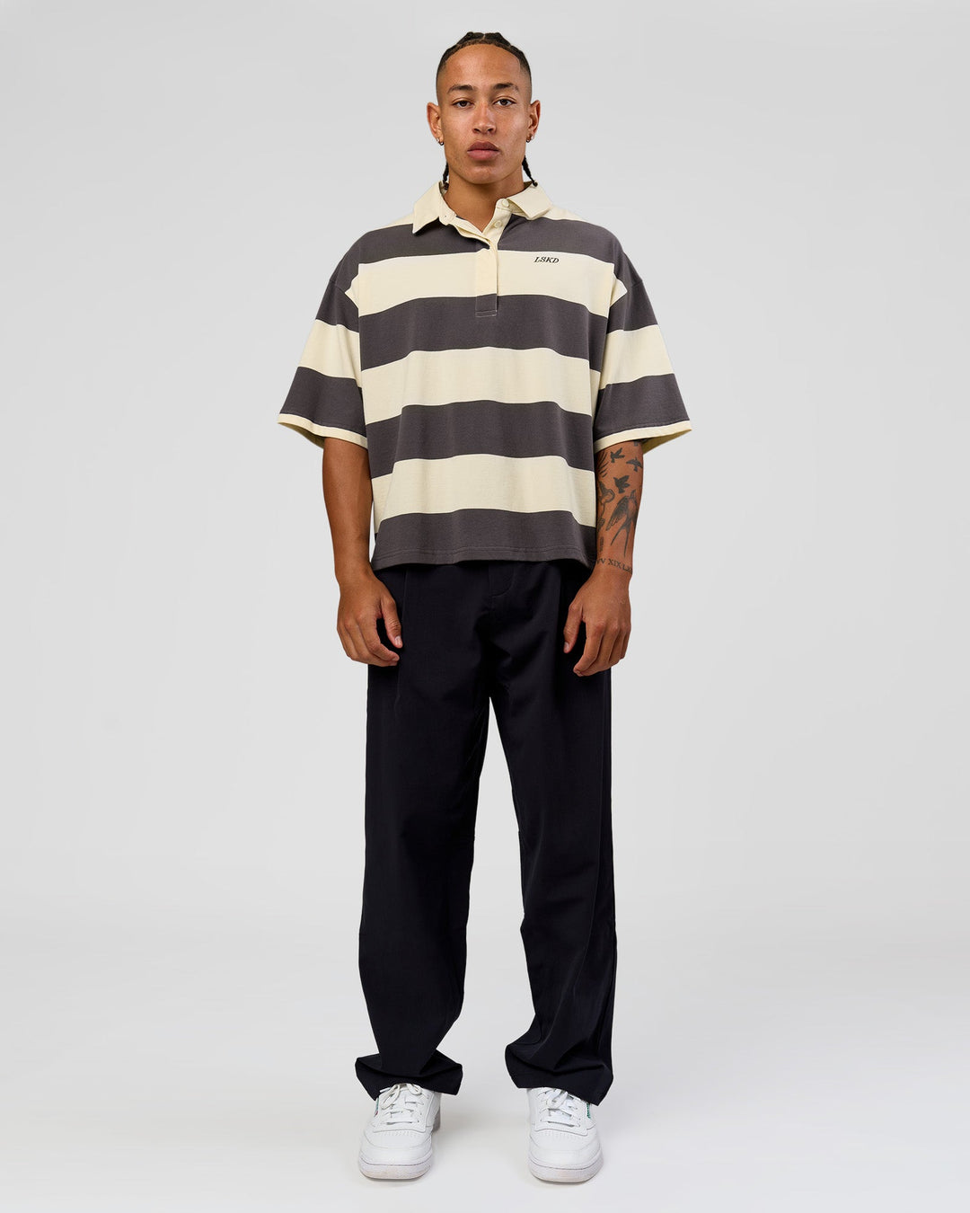 Man wearing Oversized Rugby Polo - Off White-Grey | Model:Malebo| Size:M