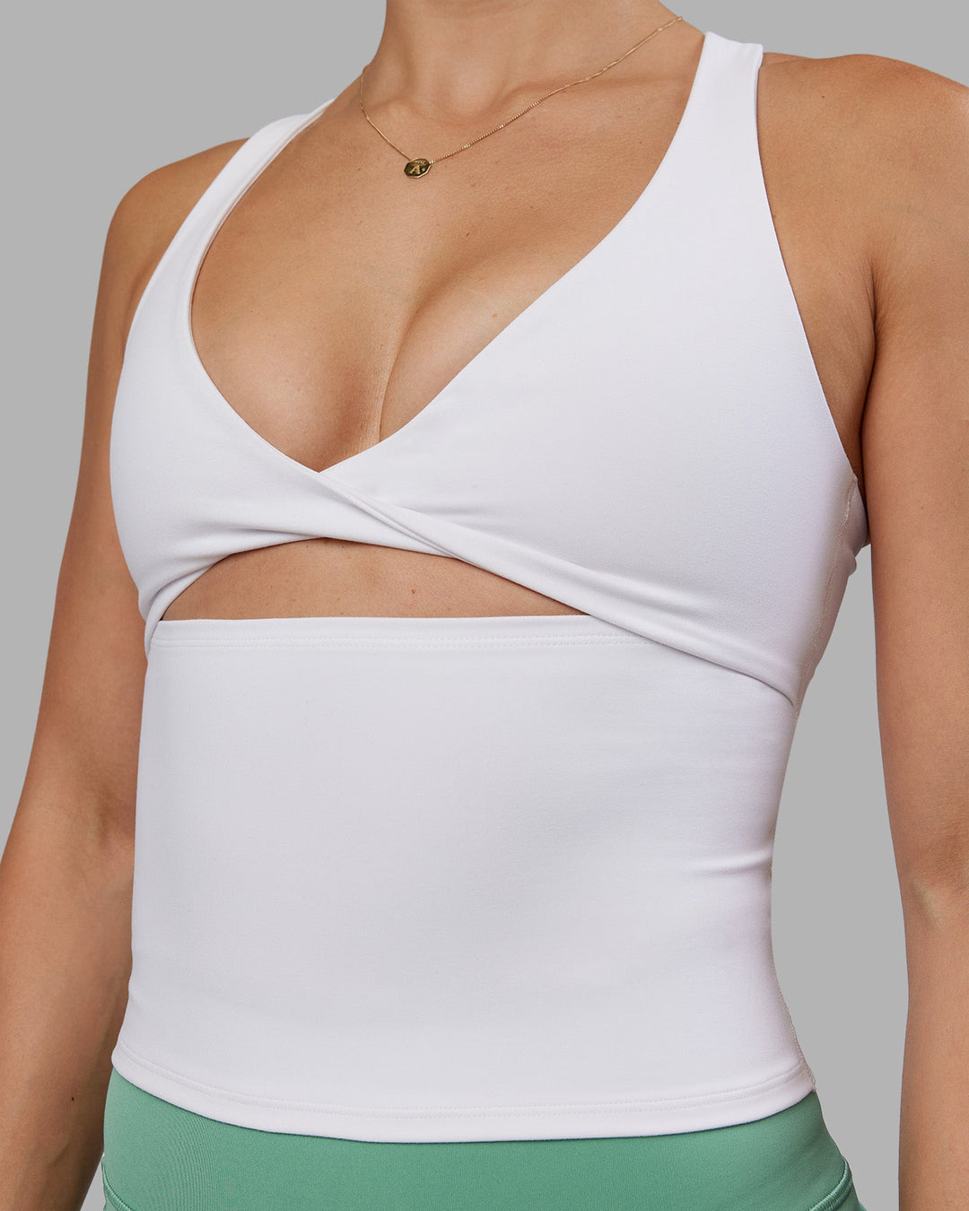 Woman wearing Abs Agile Tank - White | Model:Abbey | Size:M