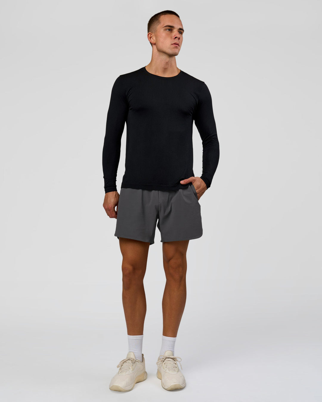Man wearing AeroFLX+ Seamless Long Sleeve Tee (Set in Sleeve) in Black/Black | Model:Albert | Size:M - view 6
