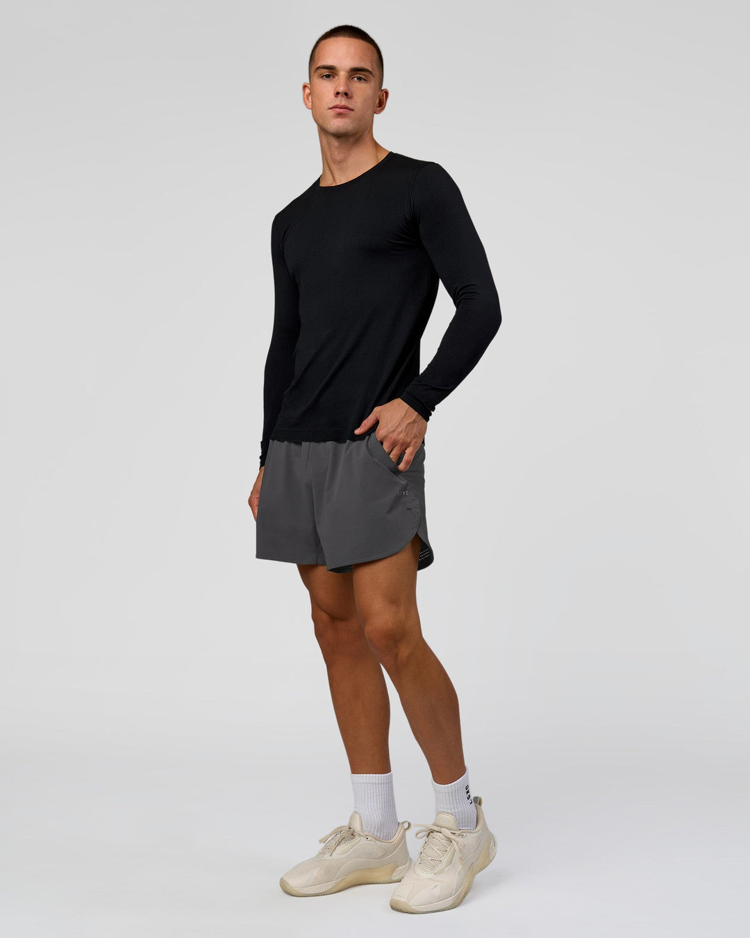 Man wearing AeroFLX+ Seamless Long Sleeve Tee (Set in Sleeve) in Black/Black | Model:Albert | Size:M - view 7