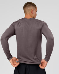 Man wearing AeroFLX+ Seamless Long Sleeve Tee (Set in Sleeve) in Duskstone/Duskstone | Model:Albert | Size:M | Thumbnail Index: 2