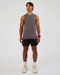 Man wearing AeroFLX+ Seamless Muscle Tank - Duskstone/Duskstone | Model:George | Size:M