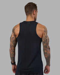 Man wearing AeroFLX+ Seamless Tank - Black Marl | Model:Tommy | Size:M