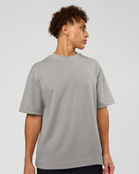 Man wearing AfterDark ZeroCrease Oversized Tee - Alloy | Model:Leandro | Size:M | Thumbnail Index: 1