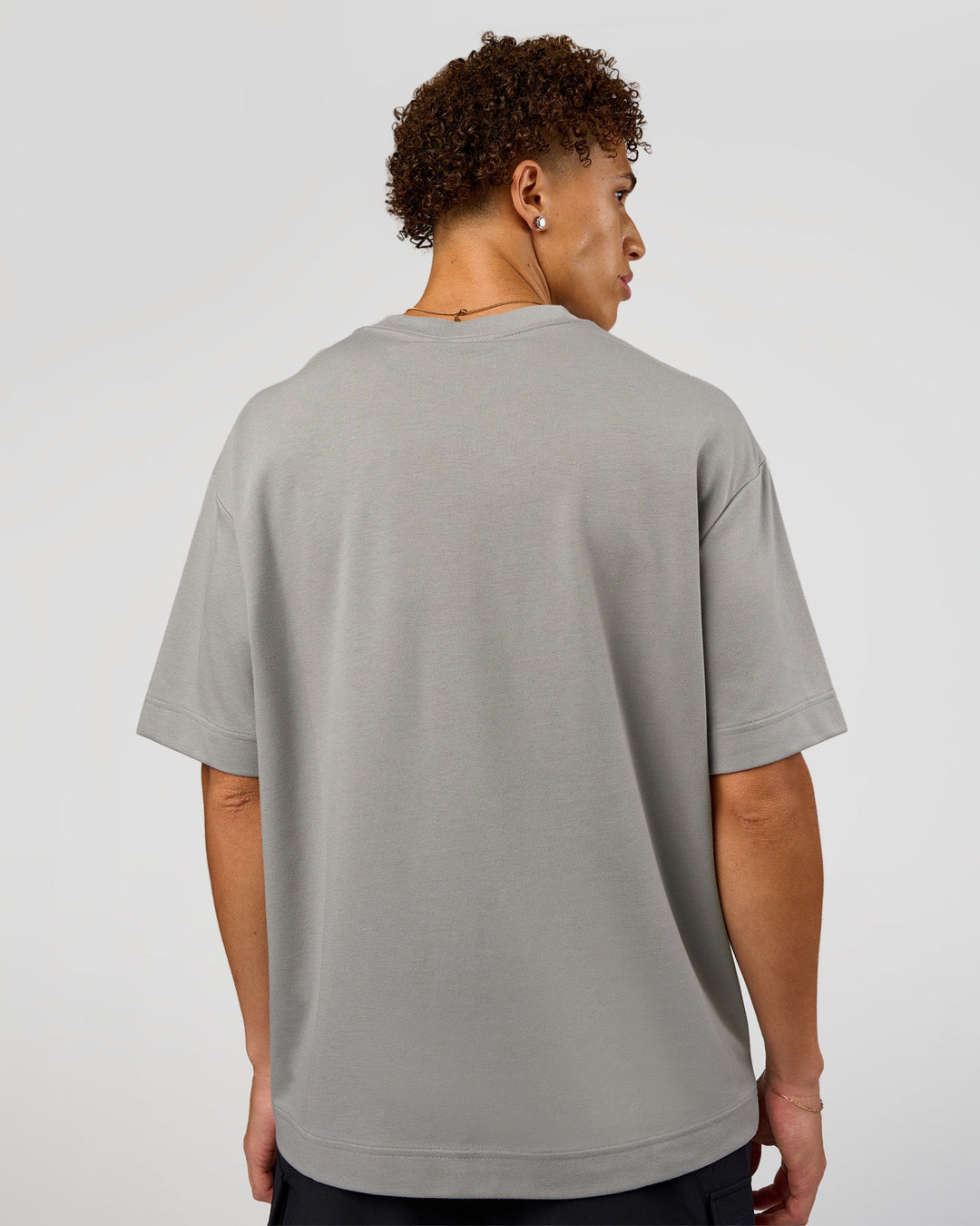 Man wearing AfterDark ZeroCrease Oversized Tee - Alloy | Model:Leandro | Size:M - view 6