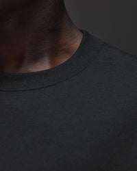 Man wearing AfterDark ZeroCrease Oversized Tee - Black | Model:Mabyro | Size:M