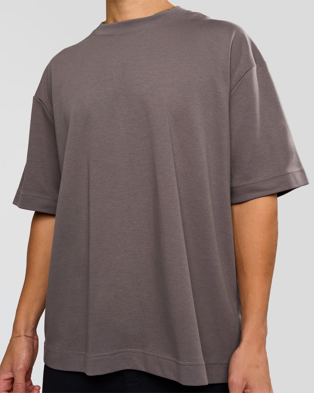 Man wearing AfterDark ZeroCrease Oversized Tee - Duskstone | Model:Leandro | Size:M