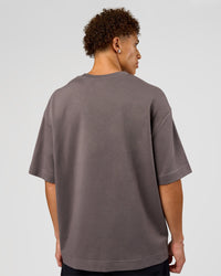 Man wearing AfterDark ZeroCrease Oversized Tee - Duskstone | Model:Leandro | Size:M