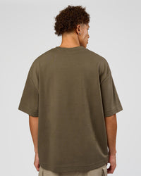 Man wearing AfterDark ZeroCrease Oversized Tee - Walnut Grey | Model:Leandro | Size:M