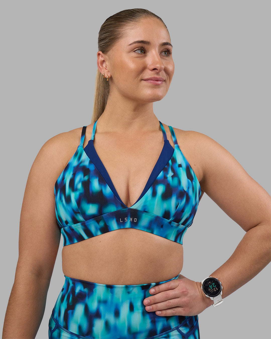 Woman wearing Aria Triangle Sports Bra - Luminous | Model:Sami | Size:M