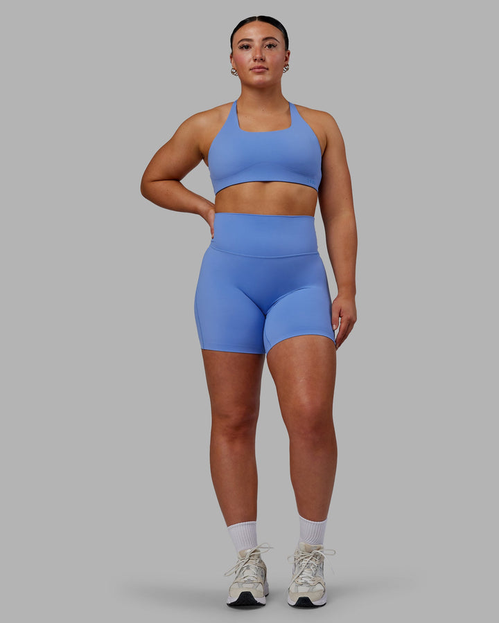 Woman wearing Aspire Sports Bra - Ultramarine
