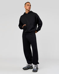 Man wearing Base Baggy Cuffed Track Pant - Black | Model:Albert | Size:M | | Thumbnail Index: 5