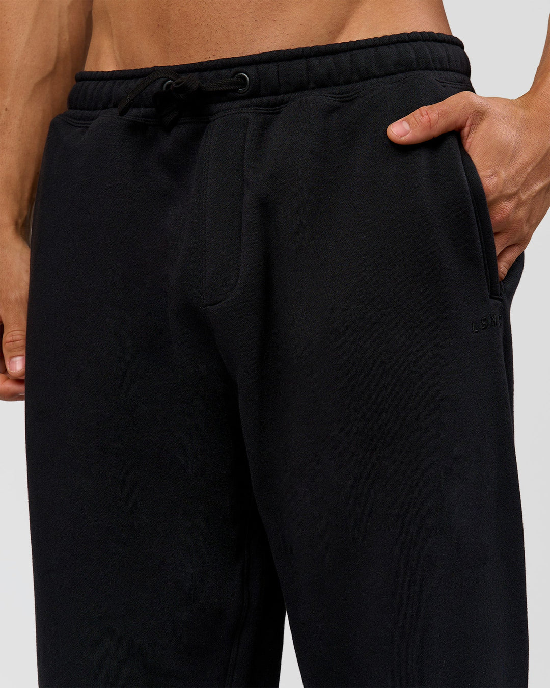Man wearing Base Baggy Cuffed Track Pant - Black | Model:Albert | Size:M | - view 5
