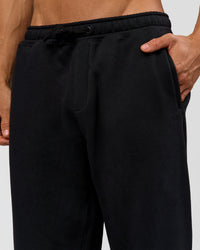 Man wearing Base Baggy Cuffed Track Pant - Black | Model:Albert | Size:M | | Thumbnail Index: 4