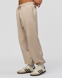 Man wearing Base Baggy Cuffed Track Pant - Shale Beige | Model:Albert | Size:M | | Thumbnail Index: 4