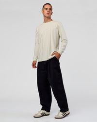 Man wearing Base FLXCotton Long Sleeve Tee in Silver Marl | Model:Albert | Size:M