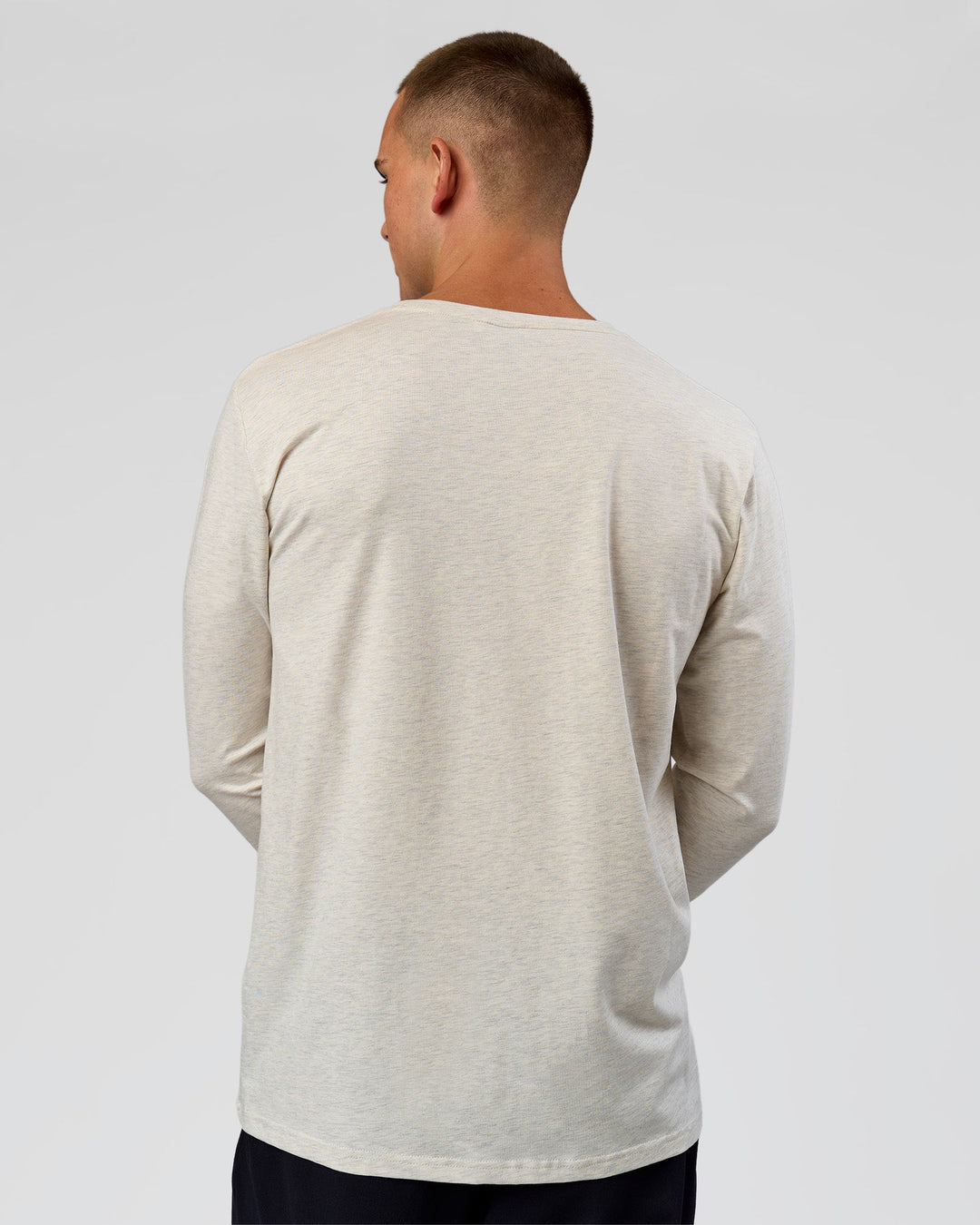 Man wearing Base FLXCotton Long Sleeve Tee in Silver Marl | Model:Albert | Size:M