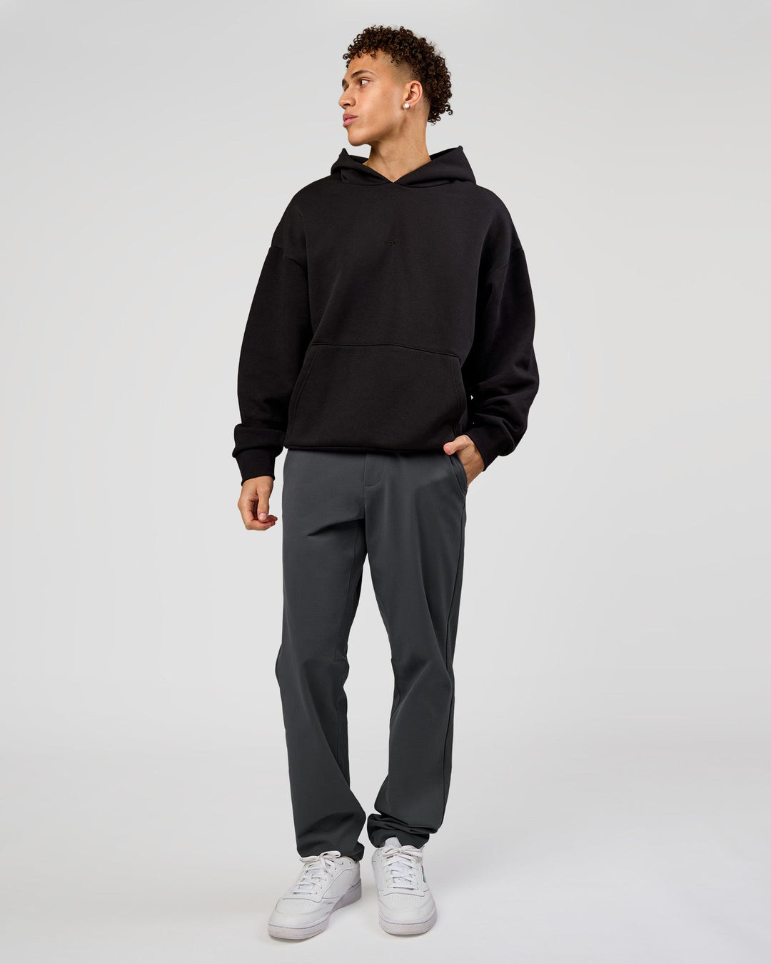 Man wearing Base Oversized Hoodie - Black | Model:Leandro | Size:M | - view 5